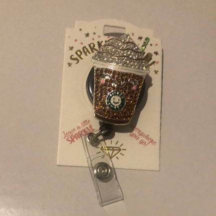 Sparkle & Shine Badge reels by Outsidethebox from Sonay Uniforms  It's reminding you to start your day with that morning cup of coffee when you need it. It's the perfect way to add a little extra wake up; to your daily routine