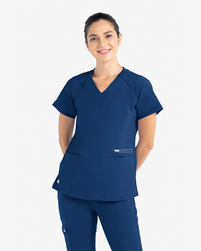 The Active Fashion Top provides comfort and support for those long hours on your feet.

Features:
V-Neckline
Two spacious pockets and a third zip pocket
VioFence antimicrobial proprietary technology

Fabric: Polyester /Rayon/ Spandex